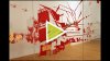 Corrie Slawson Executes a Screen Print on a 70-foot Long Glass Wall